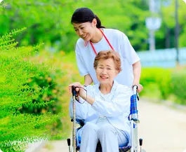 happy senior woman with her caregiver